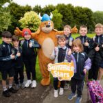 Ragnall, Waterford Libraries mascot meeting the pupils of St. Mary’s National School, Ballygunner.