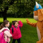 Ragnall, Waterford Libraries mascot meeting the pupils of St. Mary’s National School, Ballygunner.