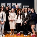 Photographer John Foley and family alongside his Peripheral Beliefs series at WGOA