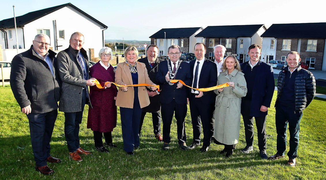 Pictured at the ribbon cutting of the new development of houses by Tuath Housing at Mountneil, Carrickpherish, Cllr. Jim D’Arcy; Sean McKeown, Chief Executive Waterford City and County Council; Angela Murphy, Vice-Chair of Tuath’s Voluntary Board of Directors; Government Chief Whip and Minister of State at the Department of Health Mary Butler TD; Seamus De Faoite, Director of Services, Waterford City and County Council, Mayor of Waterford City and County, Cllr. Seamus Ryan; Minister of State at the Department of Housing, Local Government and Heritage, John Cummins TD; Noel Frisby, Frisby Homes; Bronagh D’Arcy, Deputy CEO, Tuath Housing, James Frisby, Frisby Homes and Cllr. Frank Quinlan.